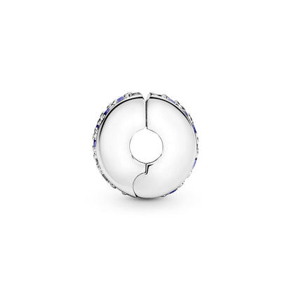 Silver clip with Swiss blue crystal, clear cubic zirconia, royal blue crystal and silicone grip