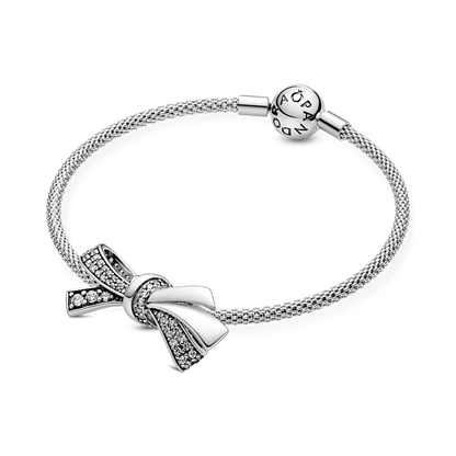 Bow silver charm with clear cubic zirconia
