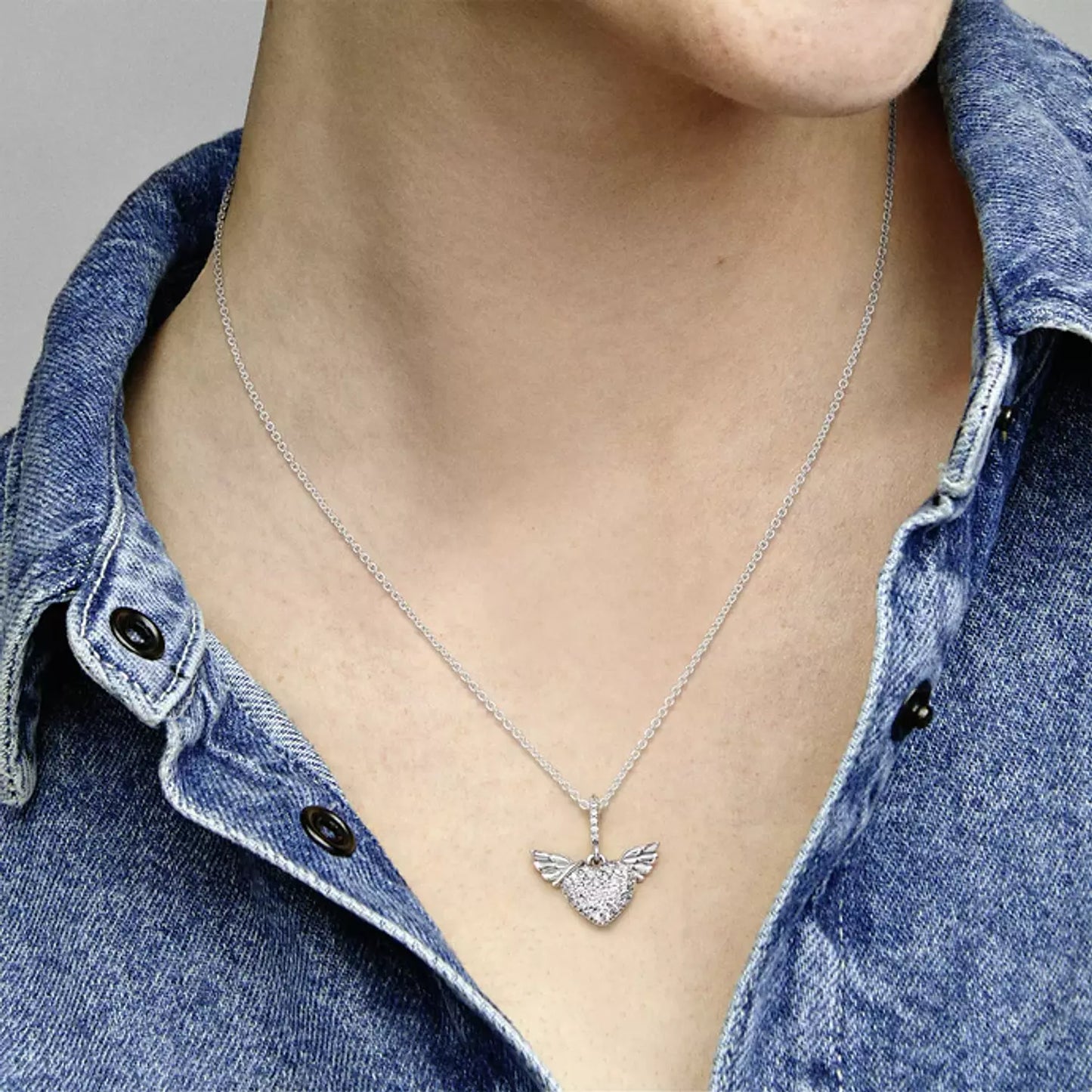 Heart and wings sterling silver pendant with clear cubic zirconia and necklace